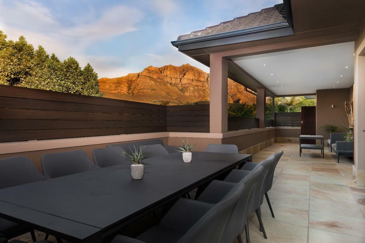 Covered patio at sunset with mountain views